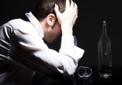 Alcohol dependence (alcoholism). Alcohol addiction. A man with a drinking problem.