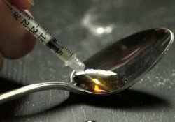 syringe with heroin 1