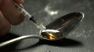 syringe with heroin 1