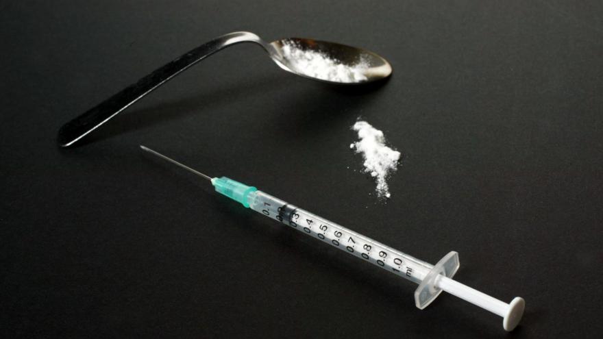 syringe with heroin 2